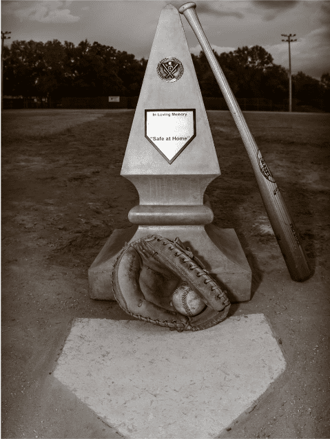 A baseball diamond with a baseball bat and ball on the ground.